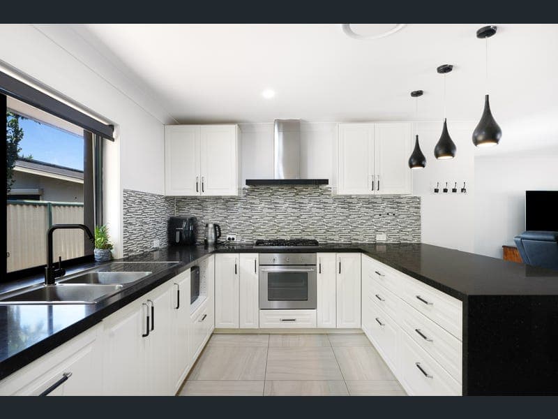 27 Merinda Court, Southport — photo 1 of 5