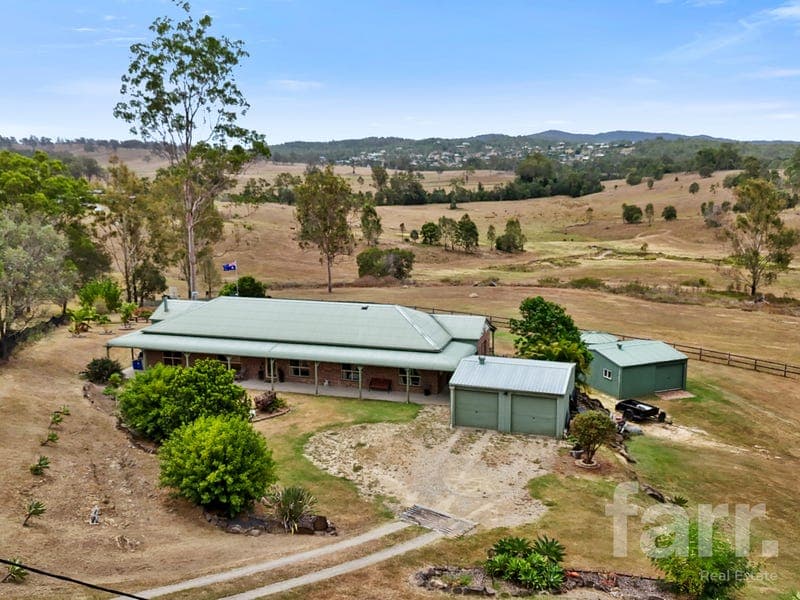 39 Bundamba Court, Mundoolun — photo 1 of 5